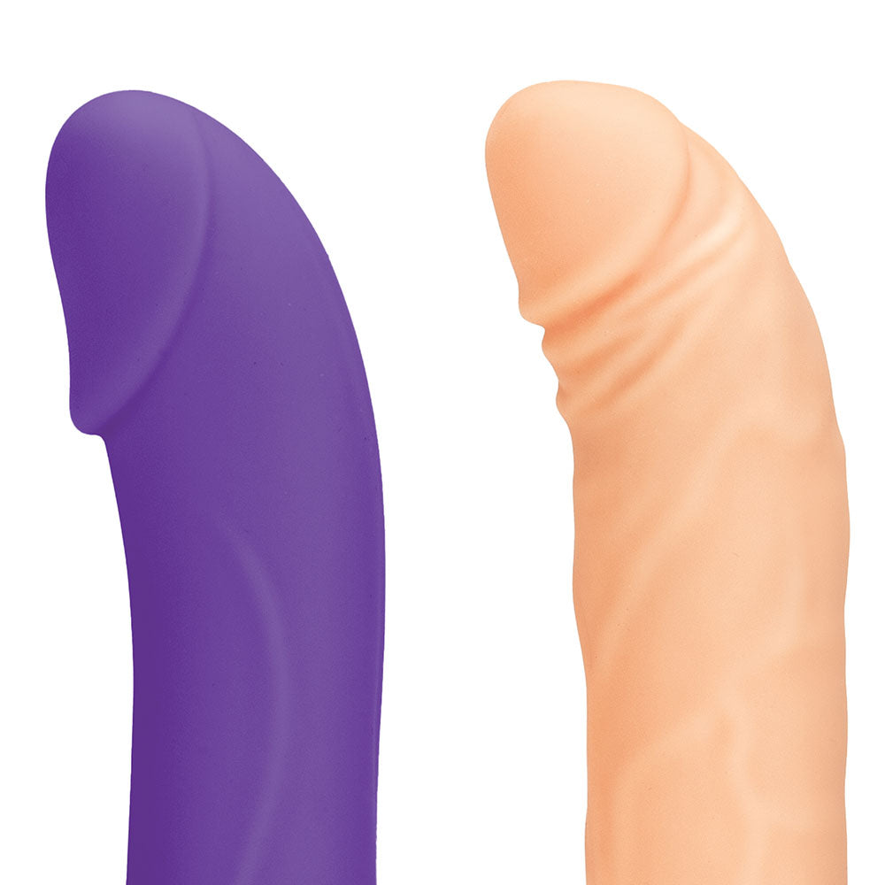 The two included life-like attachments of the Thrusting Remote-Controlled Rechargeable Compact Sex Machine by Lux Fetish